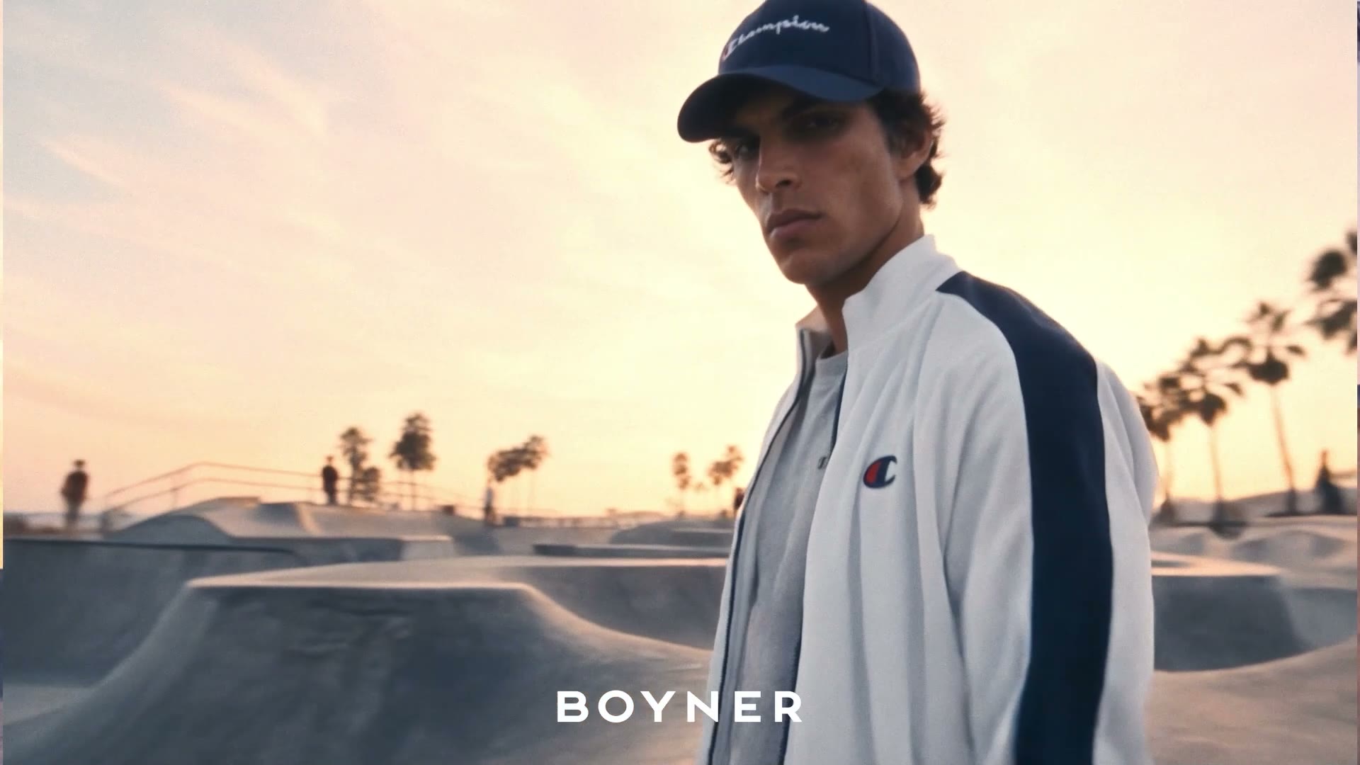 Male character close-up — cap and track jacket