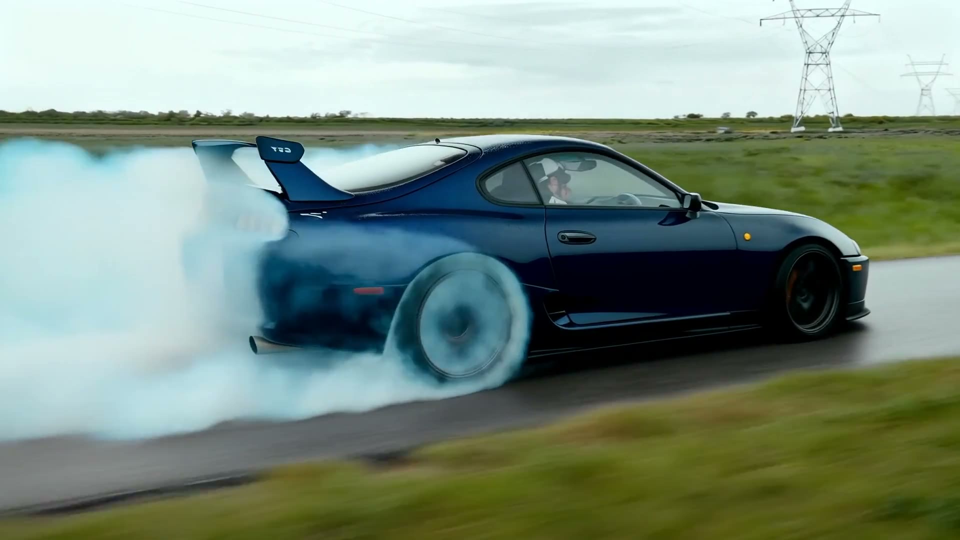 Sports car drifting on the road